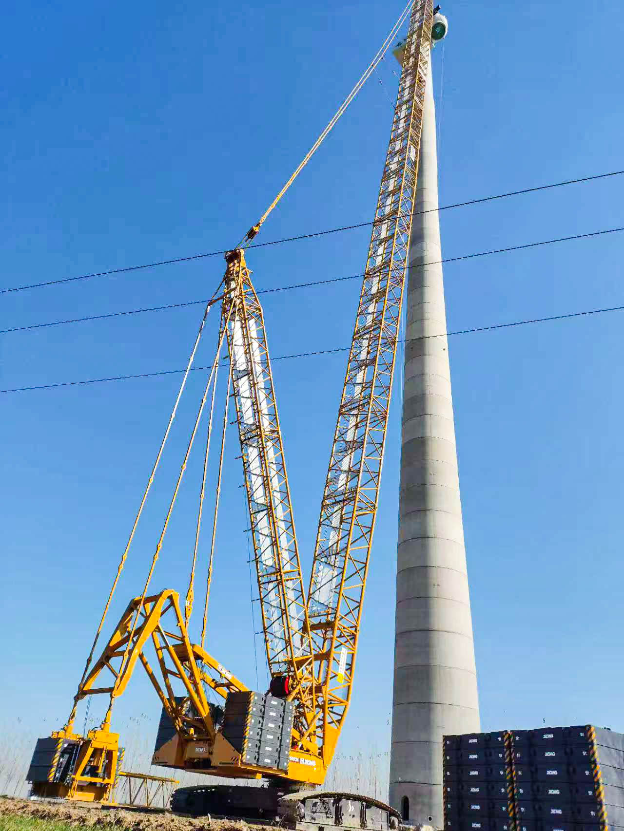 160米高空精准“搭积木”：beats365官方唯一网站XLC15000M分体吊装6.25兆瓦风机全纪录